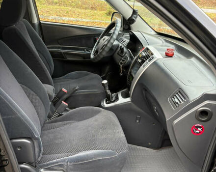 Хендай Туксон 2006 у Тернополі на Automoto.ua Чорний Хендай Туксон, об'ємом двигуна 1.99 л та пробігом 240 тис. км за 7600 $, фото 29 на Automoto.ua