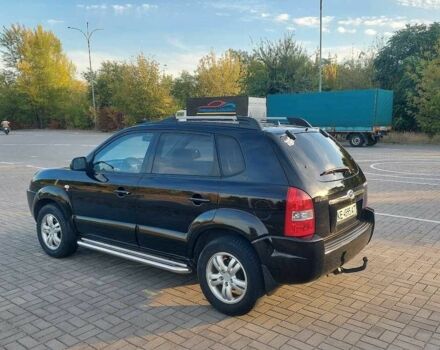 Чорний Хендай Туксон, об'ємом двигуна 2 л та пробігом 228 тис. км за 7800 $, фото 3 на Automoto.ua
