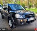 Черный Хендай Туксон, объемом двигателя 2 л и пробегом 198 тыс. км за 8900 $, фото 1 на Automoto.ua