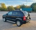 Чорний Хендай Туксон, об'ємом двигуна 2 л та пробігом 228 тис. км за 7800 $, фото 3 на Automoto.ua