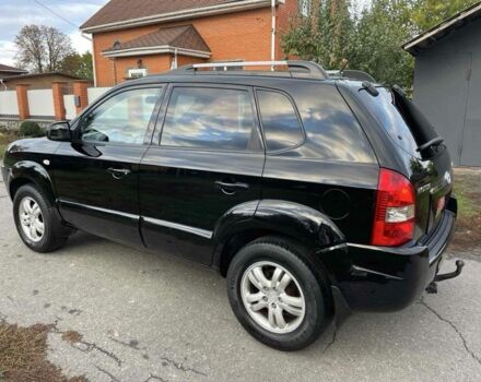 Черный Хендай Туксон, объемом двигателя 2 л и пробегом 163 тыс. км за 7700 $, фото 4 на Automoto.ua