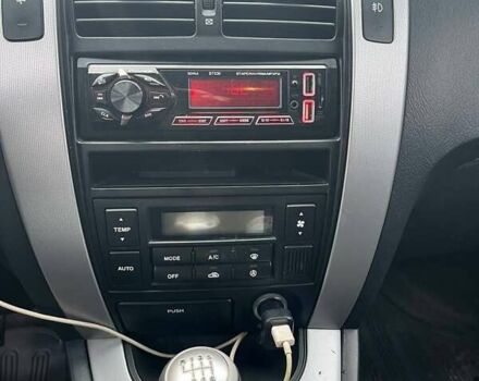 Чорний Хендай Туксон, об'ємом двигуна 2 л та пробігом 397 тис. км за 3900 $, фото 1 на Automoto.ua