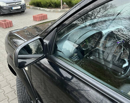 Черный Хендай Туксон, объемом двигателя 2 л и пробегом 242 тыс. км за 6999 $, фото 7 на Automoto.ua