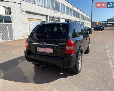 Чорний Хендай Туксон, об'ємом двигуна 2 л та пробігом 230 тис. км за 7300 $, фото 3 на Automoto.ua