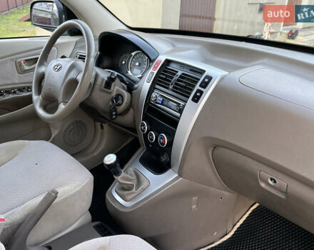 Чорний Хендай Туксон, об'ємом двигуна 1.98 л та пробігом 185 тис. км за 6850 $, фото 16 на Automoto.ua
