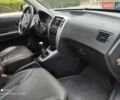 Черный Хендай Туксон, объемом двигателя 2 л и пробегом 249 тыс. км за 8300 $, фото 33 на Automoto.ua