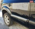Черный Хендай Туксон, объемом двигателя 1.98 л и пробегом 190 тыс. км за 7800 $, фото 2 на Automoto.ua
