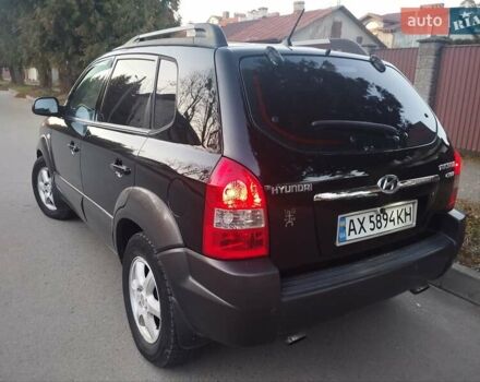 Чорний Хендай Туксон, об'ємом двигуна 1.99 л та пробігом 239 тис. км за 6990 $, фото 10 на Automoto.ua