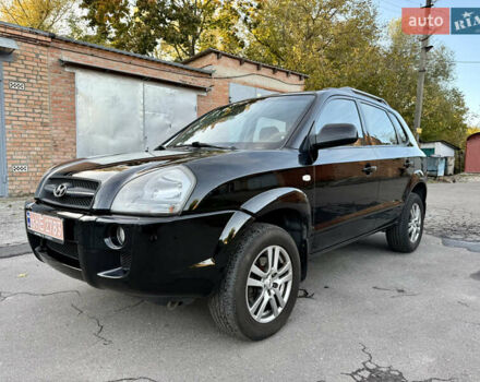 Черный Хендай Туксон, объемом двигателя 2 л и пробегом 189 тыс. км за 7150 $, фото 2 на Automoto.ua
