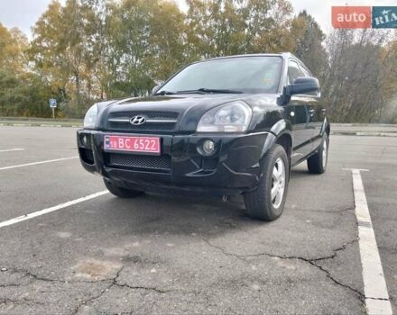Черный Хендай Туксон, объемом двигателя 2 л и пробегом 127 тыс. км за 7590 $, фото 12 на Automoto.ua