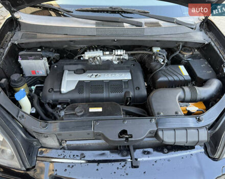 Черный Хендай Туксон, объемом двигателя 2 л и пробегом 249 тыс. км за 7450 $, фото 29 на Automoto.ua