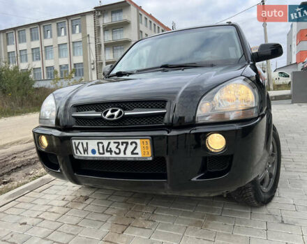 Чорний Хендай Туксон, об'ємом двигуна 2 л та пробігом 144 тис. км за 6599 $, фото 1 на Automoto.ua