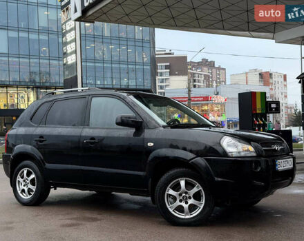 Чорний Хендай Туксон, об'ємом двигуна 1.99 л та пробігом 310 тис. км за 6399 $, фото 11 на Automoto.ua