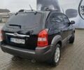 Чорний Хендай Туксон, об'ємом двигуна 2 л та пробігом 270 тис. км за 7500 $, фото 2 на Automoto.ua
