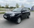 Черный Хендай Туксон, объемом двигателя 2 л и пробегом 220 тыс. км за 7200 $, фото 1 на Automoto.ua