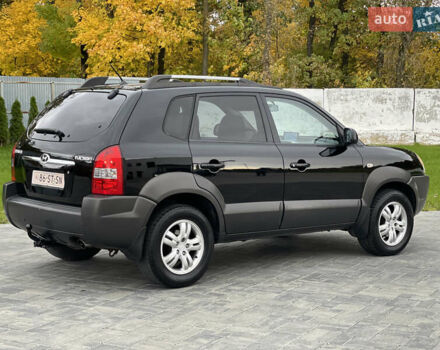 Черный Хендай Туксон, объемом двигателя 2 л и пробегом 216 тыс. км за 7500 $, фото 8 на Automoto.ua