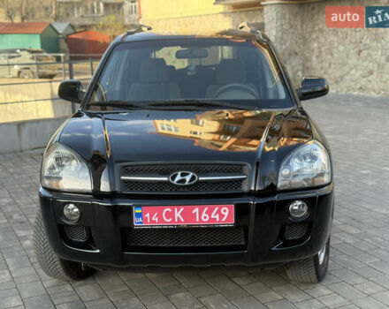 Черный Хендай Туксон, объемом двигателя 2 л и пробегом 249 тыс. км за 7450 $, фото 3 на Automoto.ua
