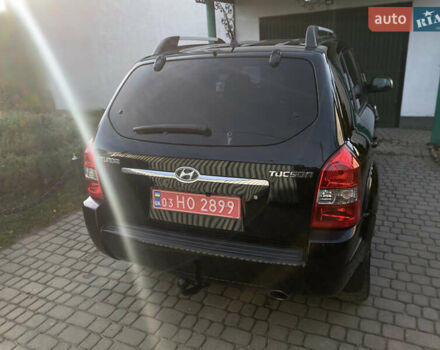 Чорний Хендай Туксон, об'ємом двигуна 1.98 л та пробігом 233 тис. км за 7650 $, фото 12 на Automoto.ua