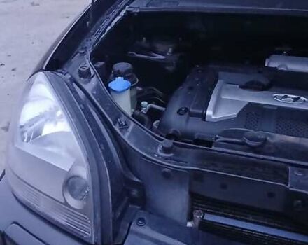 Чорний Хендай Туксон, об'ємом двигуна 1.98 л та пробігом 320 тис. км за 6500 $, фото 36 на Automoto.ua