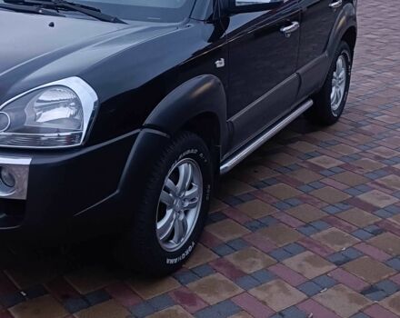 Черный Хендай Туксон, объемом двигателя 2 л и пробегом 124 тыс. км за 7200 $, фото 2 на Automoto.ua