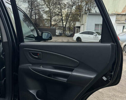 Черный Хендай Туксон, объемом двигателя 1.98 л и пробегом 198 тыс. км за 7500 $, фото 14 на Automoto.ua