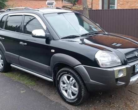 Черный Хендай Туксон, объемом двигателя 2 л и пробегом 124 тыс. км за 7200 $, фото 8 на Automoto.ua