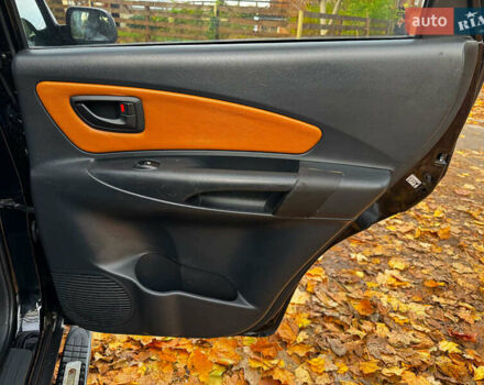 Черный Хендай Туксон, объемом двигателя 2 л и пробегом 210 тыс. км за 7990 $, фото 26 на Automoto.ua