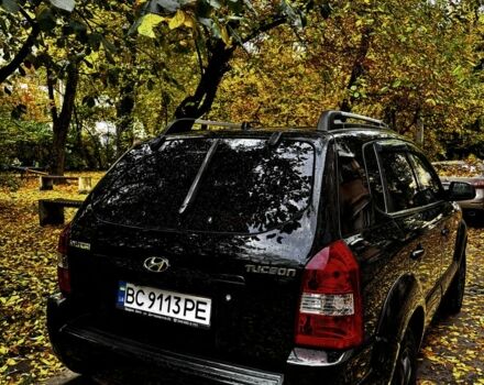 Черный Хендай Туксон, объемом двигателя 2 л и пробегом 240 тыс. км за 5600 $, фото 1 на Automoto.ua