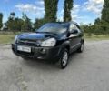 Черный Хендай Туксон, объемом двигателя 2 л и пробегом 249 тыс. км за 5800 $, фото 3 на Automoto.ua