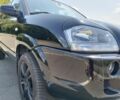Черный Хендай Туксон, объемом двигателя 2 л и пробегом 178 тыс. км за 7600 $, фото 11 на Automoto.ua