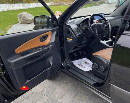 Черный Хендай Туксон, объемом двигателя 2 л и пробегом 216 тыс. км за 7500 $, фото 15 на Automoto.ua