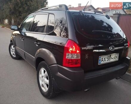 Чорний Хендай Туксон, об'ємом двигуна 1.99 л та пробігом 239 тис. км за 6990 $, фото 11 на Automoto.ua
