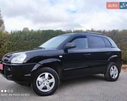 Черный Хендай Туксон, объемом двигателя 2 л и пробегом 237 тыс. км за 7999 $, фото 11 на Automoto.ua