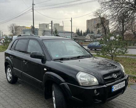 Черный Хендай Туксон, объемом двигателя 2 л и пробегом 242 тыс. км за 6999 $, фото 1 на Automoto.ua