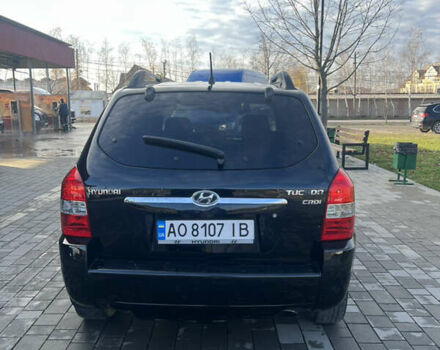Черный Хендай Туксон, объемом двигателя 2 л и пробегом 355 тыс. км за 7000 $, фото 5 на Automoto.ua