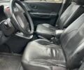 Черный Хендай Туксон, объемом двигателя 2 л и пробегом 159 тыс. км за 8650 $, фото 4 на Automoto.ua