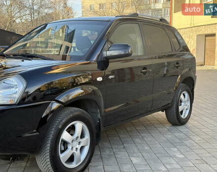 Черный Хендай Туксон, объемом двигателя 2 л и пробегом 249 тыс. км за 7450 $, фото 11 на Automoto.ua