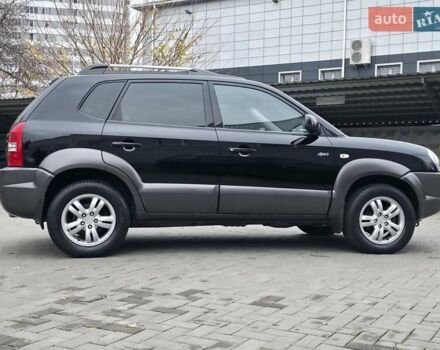 Чорний Хендай Туксон, об'ємом двигуна 1.98 л та пробігом 123 тис. км за 7950 $, фото 23 на Automoto.ua