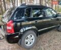 Черный Хендай Туксон, объемом двигателя 1.98 л и пробегом 279 тыс. км за 7800 $, фото 2 на Automoto.ua