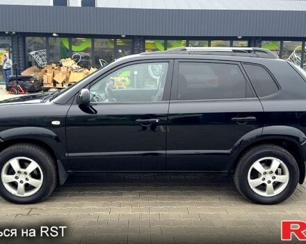 Черный Хендай Туксон, объемом двигателя 2 л и пробегом 200 тыс. км за 7800 $, фото 3 на Automoto.ua