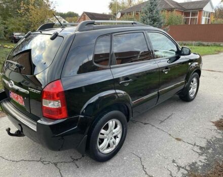 Черный Хендай Туксон, объемом двигателя 2 л и пробегом 163 тыс. км за 7700 $, фото 3 на Automoto.ua