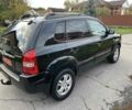 Черный Хендай Туксон, объемом двигателя 2 л и пробегом 163 тыс. км за 7700 $, фото 3 на Automoto.ua