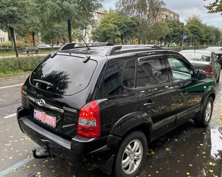 Черный Хендай Туксон, объемом двигателя 2 л и пробегом 194 тыс. км за 7250 $, фото 27 на Automoto.ua