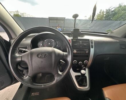 Черный Хендай Туксон, объемом двигателя 2 л и пробегом 249 тыс. км за 5800 $, фото 8 на Automoto.ua
