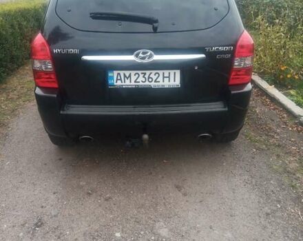 Черный Хендай Туксон, объемом двигателя 2 л и пробегом 231 тыс. км за 8500 $, фото 10 на Automoto.ua