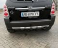 Чорний Хендай Туксон, об'ємом двигуна 2 л та пробігом 124 тис. км за 7950 $, фото 1 на Automoto.ua