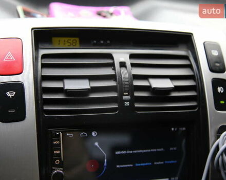 Черный Хендай Туксон, объемом двигателя 2.66 л и пробегом 217 тыс. км за 8600 $, фото 15 на Automoto.ua