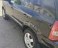 Черный Хендай Туксон, объемом двигателя 2 л и пробегом 295 тыс. км за 7700 $, фото 8 на Automoto.ua