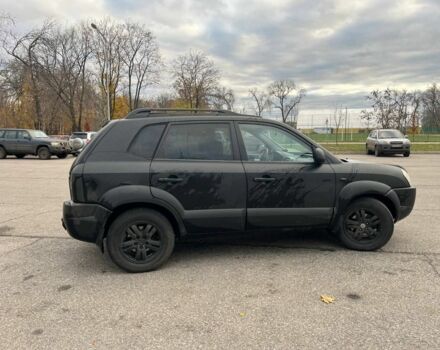 Черный Хендай Туксон, объемом двигателя 2 л и пробегом 397 тыс. км за 3900 $, фото 2 на Automoto.ua