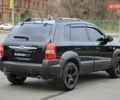 Черный Хендай Туксон, объемом двигателя 2.66 л и пробегом 217 тыс. км за 8600 $, фото 5 на Automoto.ua